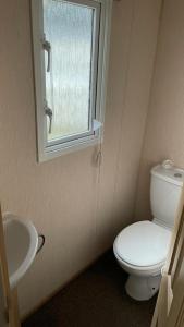Ванная комната в Mudeford Beach Lodge