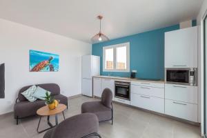 Köök või kööginurk majutusasutuses SeaCove & SeaSide Villas, classées 4 étoiles