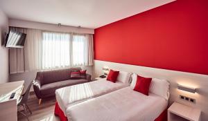 Postel nebo postele na pokoji v ubytování Hotel Julimar