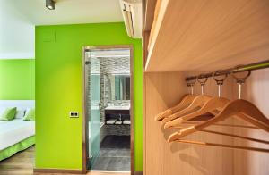 Postel nebo postele na pokoji v ubytování Hotel Julimar