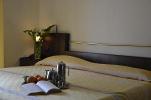 Postel nebo postele na pokoji v ubytování Hotel Marabel