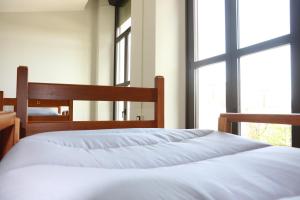 Postel nebo postele na pokoji v ubytování Student's Hostel Parma
