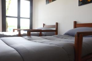 Postel nebo postele na pokoji v ubytování Student's Hostel Parma