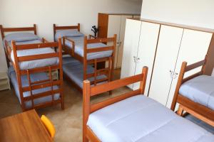 Postel nebo postele na pokoji v ubytování Student's Hostel Parma