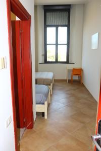 Postel nebo postele na pokoji v ubytování Student's Hostel Parma