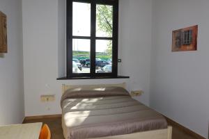 Postel nebo postele na pokoji v ubytování Student's Hostel Parma
