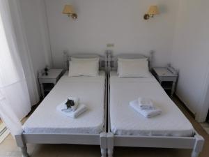Postel nebo postele na pokoji v ubytování Hotel Rania