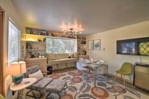 a living room with a couch and a table at Balcony and Forest Views Cabin in Pioneer! in Pioneer +18 photos