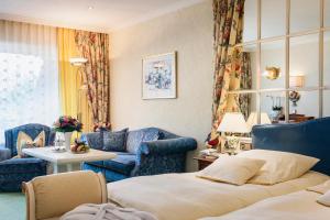 Istumisnurk majutusasutuses Relais & Châteaux Hotel Schwarzmatt