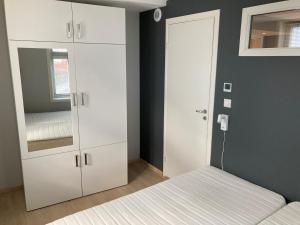 Kuchyň nebo kuchyňský kout v ubytování Skansen Apartments
