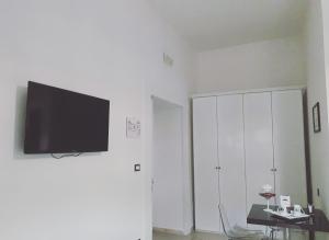 TV a/nebo společenská místnost v ubytování La Locanda del Baffo