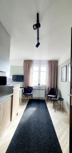 Posteľ alebo postele v izbe v ubytovaní Apartamenty w Kamienicy - centrum, bezpłatny parking + 23 fotografií