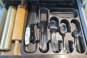 a drawer filled with silver utensils and utensils sidx sidx sidx at 5 Bedroom House All ensuite...sleeps up to 10 in Swindon