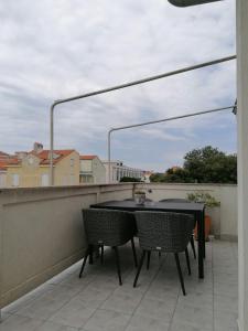 Balkón nebo terasa v ubytování Apartment and room Gušćić