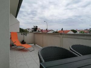 Balkón nebo terasa v ubytování Apartment and room Gušćić
