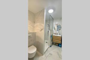 Koupelna v ubytování T2 Océan à 2 minutes à pied pour 4 + parking