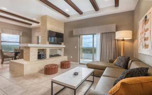 a living room with a couch and a table at WorldMark Marble Falls in Marble Falls