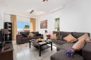 A seating area at Villa Calma by Villa Plus