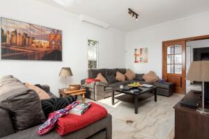 A seating area at Villa Calma by Villa Plus