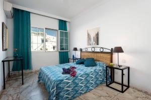 A bed or beds in a room at Villa Calma by Villa Plus
