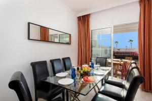 A seating area at Villa Calma by Villa Plus