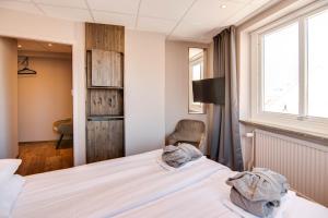 Voodi või voodid majutusasutuse Karlskrona H&H toas
