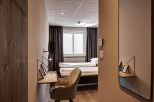 Voodi või voodid majutusasutuse Karlskrona H&H toas