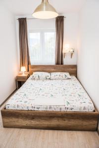 Postel nebo postele na pokoji v ubytování Apartment Sea&Sky