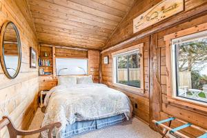 Ένα ή περισσότερα κρεβάτια σε δωμάτιο στο Cozy Cottage by the Sea