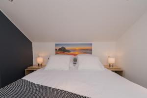 Postel nebo postele na pokoji v ubytování Apartmani Mate i Niko + 80 fotografií