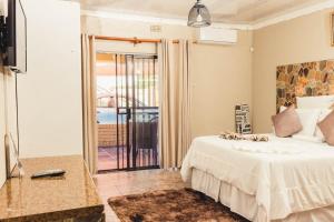APICAL GUESTHOUSE客房内的一张或多张床位