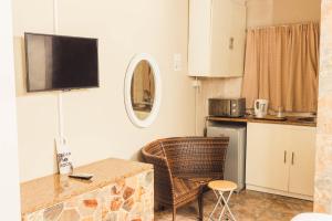 APICAL GUESTHOUSE的厨房或小厨房