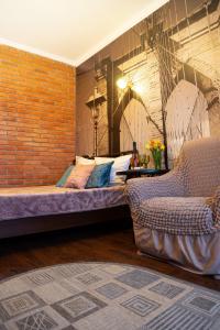 Ένα ή περισσότερα κρεβάτια σε δωμάτιο στο Guest House on 174А Shevchenko Street