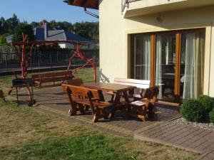 Un patio sau altă zonă în aer liber la Gościniec Klejnot