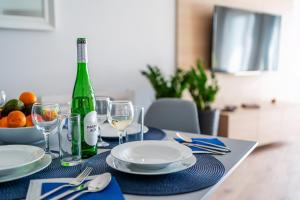 Televízia a/alebo spoločenská miestnosť v ubytovaní Słoneczna Zatoka