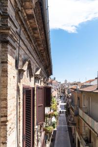 a view of an alley from a building at La Casa sul Corso e la Casa sui tetti in Citta' Sant'Angelo