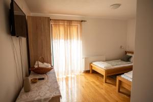 Postel nebo postele na pokoji v ubytování Kuća za odmor Vallirea