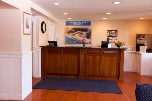 a waiting area of a dental office with a reception desk at Edgewater Beach Resort, a VRI resort in Dennis Port