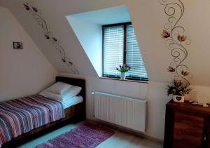 Posteľ alebo postele v izbe v ubytovaní Müezzin Apartman