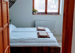 Posteľ alebo postele v izbe v ubytovaní Müezzin Apartman