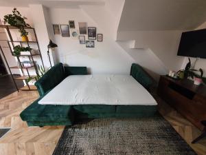 Posteľ alebo postele v izbe v ubytovaní Apartament w centrum 3