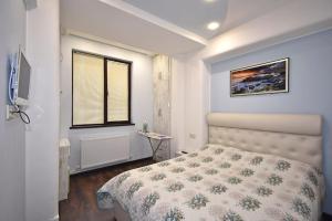 Postel nebo postele na pokoji v ubytování Luxury Apartment in Republic Square