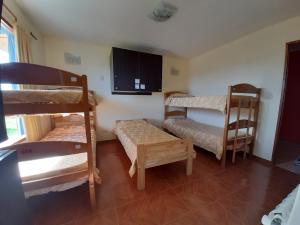 Кровать или кровати в номере Matices Hostel Terminal