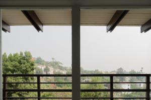 a window with a view of a mountain view at Hollywood Hills Hotel in Los Angeles