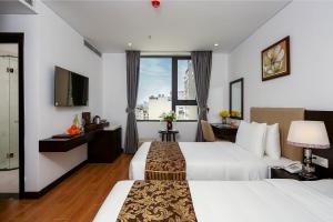 Sjónvarps- og/eða afþreyingartæki á Golden Line Hotel Danang