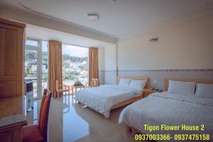 Cama o camas de una habitación en Tigon Flower House 2