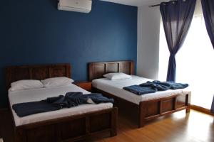 Katil atau katil-katil dalam bilik di Park View Hotel & Restaurant