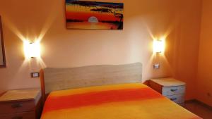 Ένα ή περισσότερα κρεβάτια σε δωμάτιο στο Le 3 Palme +27 φωτογραφίες