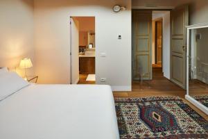 Posteľ alebo postele v izbe v ubytovaní Casa Gugù