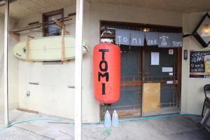 Majutusasutuses TOMI in Shimoda olev sertifikaat, autasu, silt või muu dokument